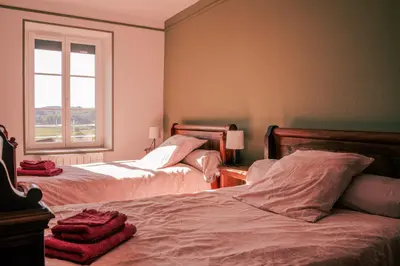 Un ou plusieurs lits dans un hébergement de l'établissement Le Champ Du Possible