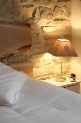 Un ou plusieurs lits dans un hébergement de l'établissement La Maison au Comptoir