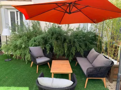 Jardin de l'établissement Natural Suite en centre ville avec SPA et jardin