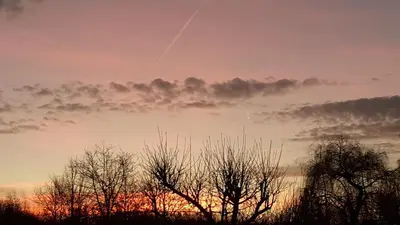 Lever ou coucher de soleil vu de la maison de vacances ou à proximité