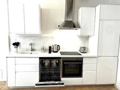 Cuisine ou kitchenette dans l'établissement La Duchesse - Grand Appartement - Avec Climatisation