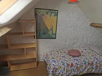 Un ou plusieurs lits dans un hébergement de l'établissement Maison de campagne isolée pour famille