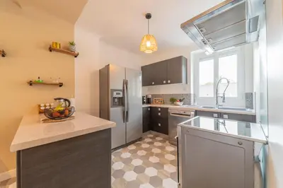 Cuisine ou kitchenette dans l'établissement Coté Cour