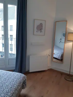Un ou plusieurs lits dans un hébergement de l'établissement Cosy T2 31m2 - Centre-Ville Dijon - Gare et Darcy