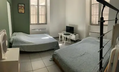 Un ou plusieurs lits dans un hébergement de l'établissement STUDIO Dole Grevy deux étoiles,