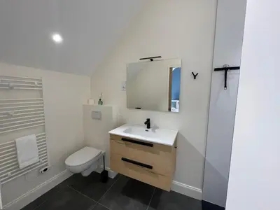 Salle de bains dans l'établissement Le Clos des Gargouilles