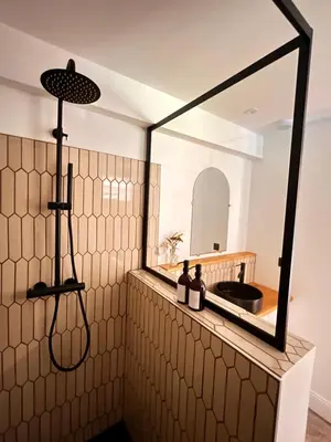 Salle de bains dans l'établissement Les Chambres du parc