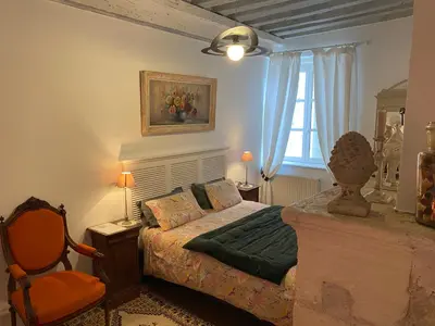 Un ou plusieurs lits dans un hébergement de l'établissement Le pigeonnier de Saint-Loup Bed and Breakfast