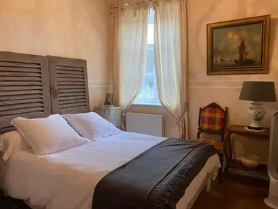 Un ou plusieurs lits dans un hébergement de l'établissement Le pigeonnier de Saint-Loup Bed and Breakfast