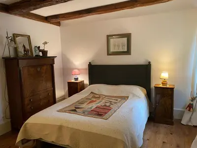 Un ou plusieurs lits dans un hébergement de l'établissement Le pigeonnier de Saint-Loup Bed and Breakfast