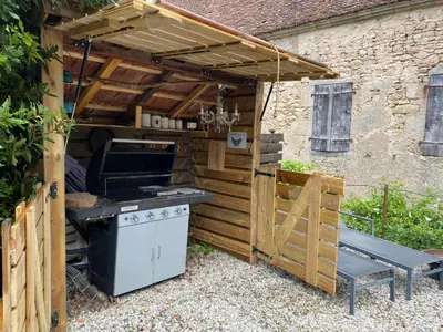 Cuisine ou kitchenette dans l'établissement Fleurs au Bourg