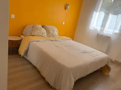 Un ou plusieurs lits dans un hébergement de l'établissement Gite chez Carolanne et Julien