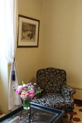 Coin salon dans l'établissement Château de Prety - Maison d'Hôtes