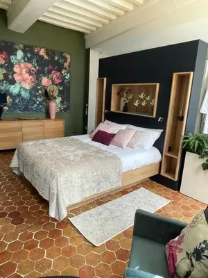 Un ou plusieurs lits dans un hébergement de l'établissement Suite avec Spa Quartier Cathédrale