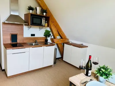 Cuisine ou kitchenette dans l'établissement Chez Pierrette à deux pas du Château de Meursault