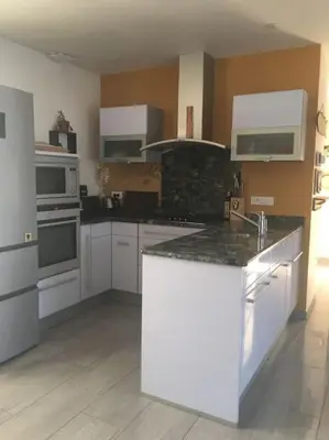 Cuisine ou kitchenette dans l'établissement Ti'KiCaz