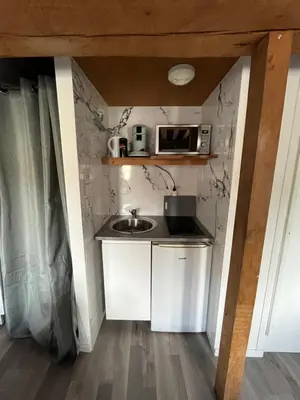 Cuisine ou kitchenette dans l'établissement Le cocoon Nuits