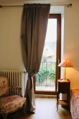 Un ou plusieurs lits dans un hébergement de l'établissement Maison Céleste