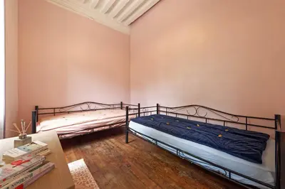 Un ou plusieurs lits dans un hébergement de l'établissement château de millery