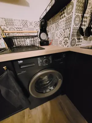 Cuisine ou kitchenette dans l'établissement Quartier République avec terrasse