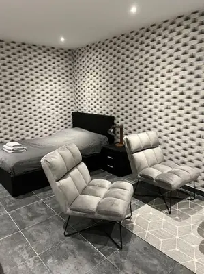 Coin salon dans l'établissement Joli appartement