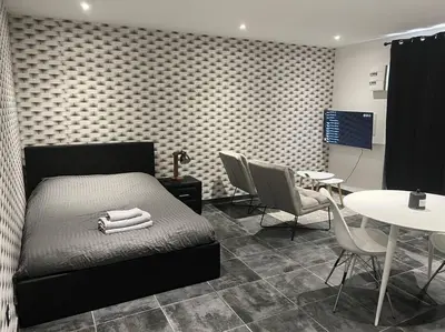 Coin salon dans l'établissement Joli appartement