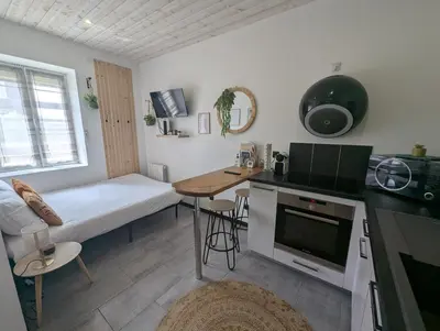 Cuisine ou kitchenette dans l'établissement Studio cosy proche du centre-ville