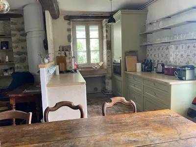 Cuisine ou kitchenette dans l'établissement Chez Katia