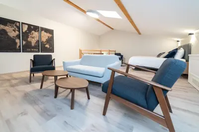 Coin salon dans l'établissement Les coursives appartements