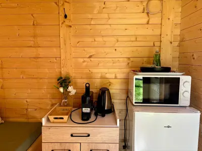 Cuisine ou kitchenette dans l'établissement Camping Les Voiles Sur Grosne