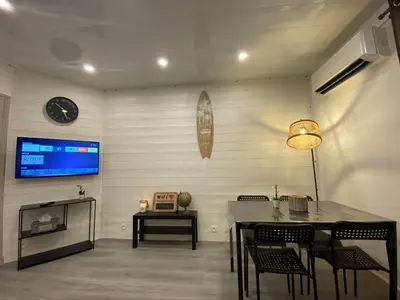 Télévision ou salle de divertissement dans l'établissement Le Pasteur Duplex Confort Centre Ville