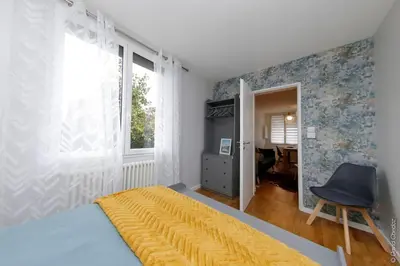 Un ou plusieurs lits dans un hébergement de l'établissement Maison « De Ville en Vigne »