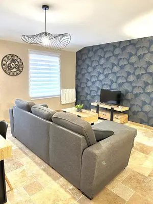 Coin salon dans l'établissement Le Petit Phuket - Proche du centre ville de Mâcon - Appartement confortable et calme - Stationnement facile à proximité