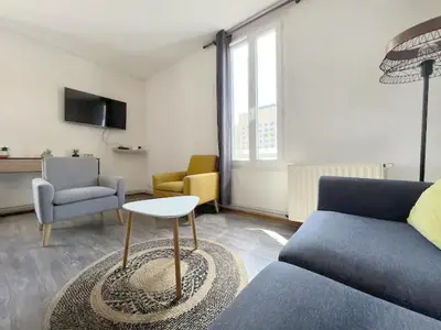 Coin salon dans l'établissement La Gare: 50m2, 4 Prs, 2 Ch - Proximité cité gastro