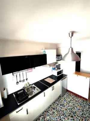 Cuisine ou kitchenette dans l'établissement Idéalement situé pour tous Dijon