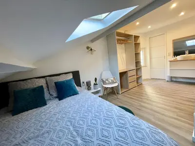 Un ou plusieurs lits dans un hébergement de l'établissement APPARTEMENT 1 CHAMBRE AVEC ENTREE INDIVIDUEL