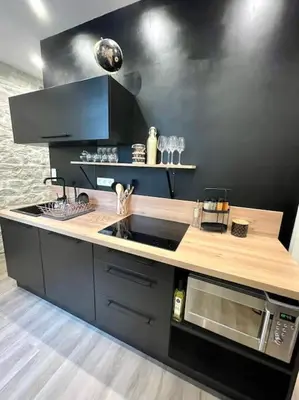 Cuisine ou kitchenette dans l'établissement APPARTEMENT 1 CHAMBRE AVEC ENTREE INDIVIDUEL