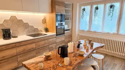 Cuisine ou kitchenette dans l'établissement Plasne et vous dans le Jura