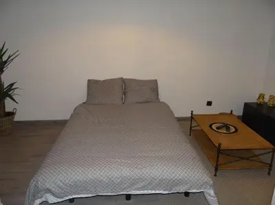 Un ou plusieurs lits dans un hébergement de l'établissement Cosy Loft - Appartement de charme