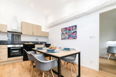 Cuisine ou kitchenette dans l'établissement Le Graff - Locationtournus