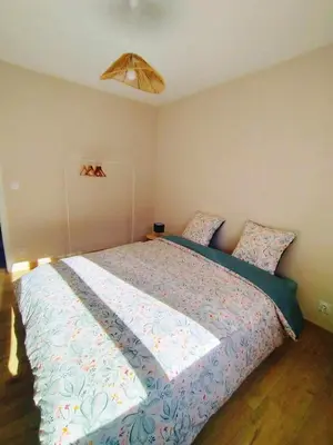 Un ou plusieurs lits dans un hébergement de l'établissement L'étape Nuitonne - Gîte avec jardin pour 6 personnes