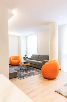 Coin salon dans l'établissement Suite Romanée 6 personnes vue Cathédrale 2 Places de parking