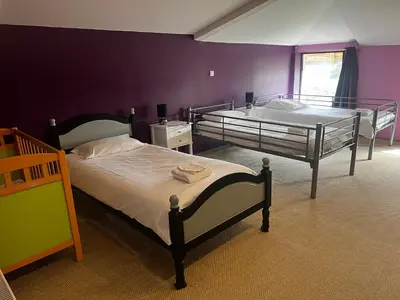 Un ou plusieurs lits dans un hébergement de l'établissement La Ferme du Tilleul