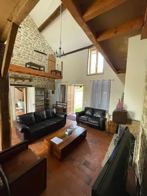 Coin salon dans l'établissement Gîte le Ch'armançon