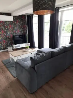 Coin salon dans l'établissement Superbe appartement climatisé au centre ville 777