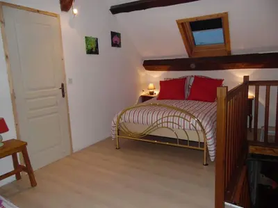Un ou plusieurs lits dans un hébergement de l'établissement Gîte La Roussette 3 étoiles