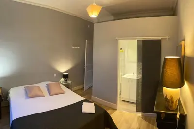 Un ou plusieurs lits dans un hébergement de l'établissement Gîte au Balcon