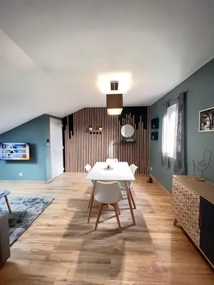 Coin salon dans l'établissement Charmant appartement proche du centre ville