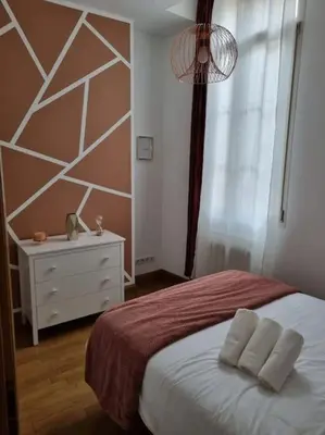 Un ou plusieurs lits dans un hébergement de l'établissement L'APPART'JEANNIN HYPER CENTRE