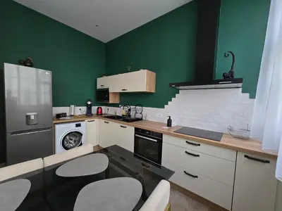 Cuisine ou kitchenette dans l'établissement Loft Esprit & Lumière